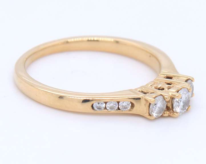 Charming Yellow Gold 3 Stone Diamond Ring