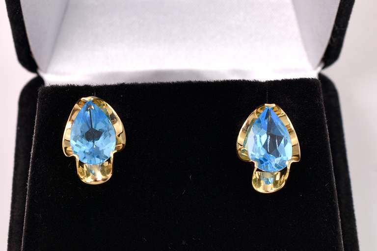 Brilliant Blue Topaz Earrings in 14K Yellow Gold