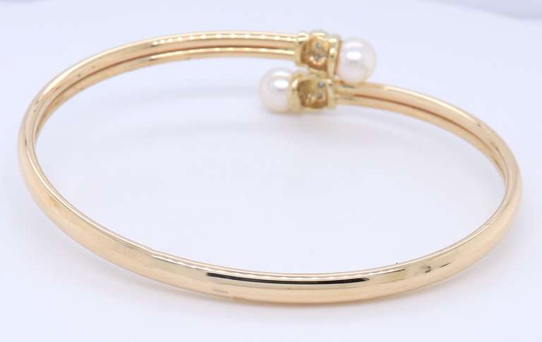 Wonderful Yellow Gold Pearl and Diamond Flex Bangle Bracelet