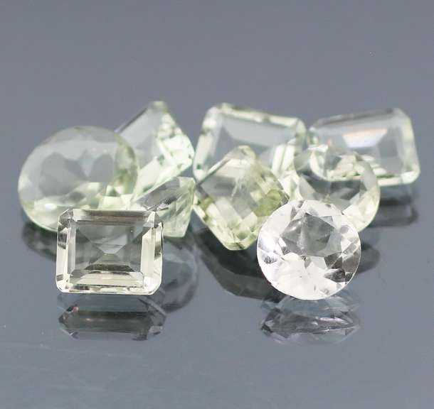 Gem grade 25.88ct multi-faceted green Quartz set