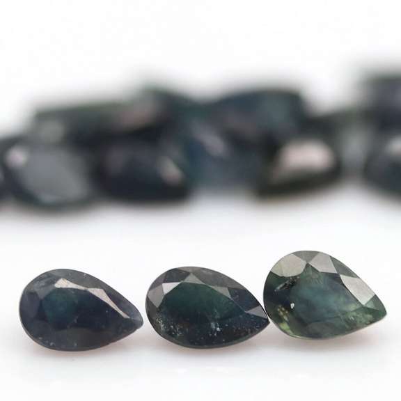 Heated only! 10.83ct blue green Sapphire set