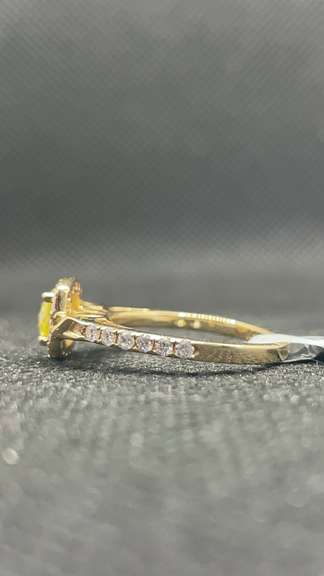 STUNNING FANCY YELLOW DIAMOND ENGAGEMENT RING