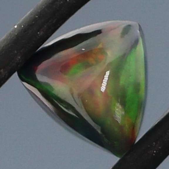 Magnificent .89ct full body flashing Black Opal