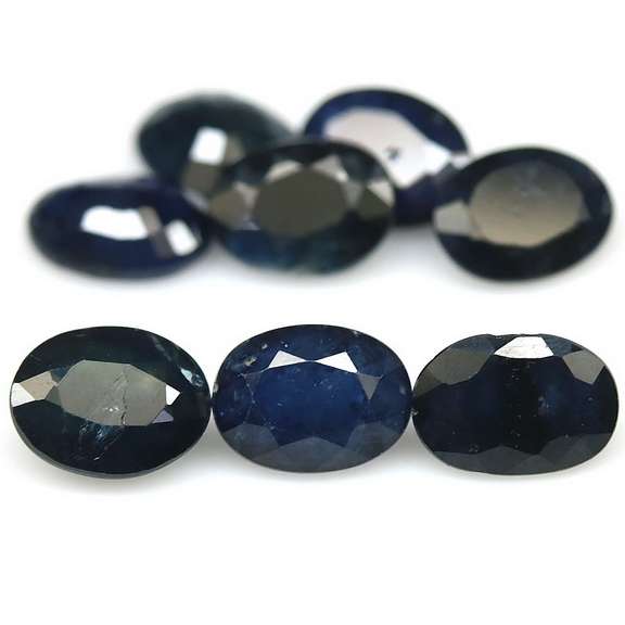 Heated only! 11.90ct Royal blue Sapphire set