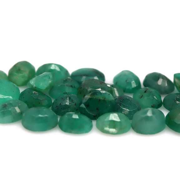 Oval cut 8.56ct Zambian Emerald set