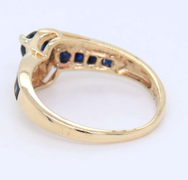 Charming Yellow Gold Pear Shaped and Princess Cut Blue Sapphire Channel Set Ring
