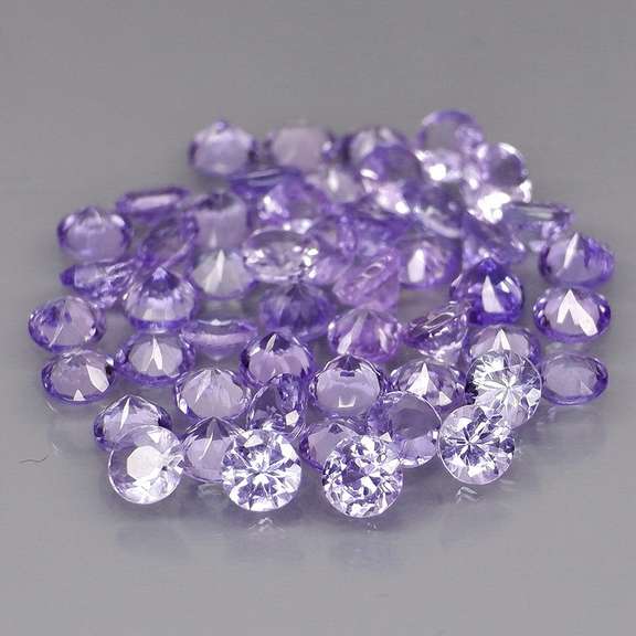 Heavy flashing 4.26ct diamond cut Tanzanite set