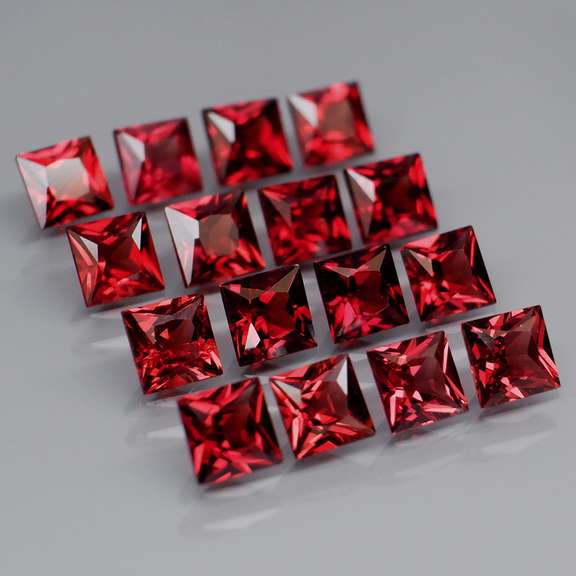 Tremendous 7.46ct princess cut cherry red Garnet set