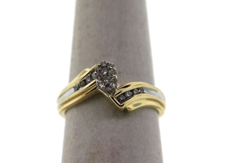 Pretty Oval Cluster Diamond Ring with Channel Set Diamonds and 14k Gold