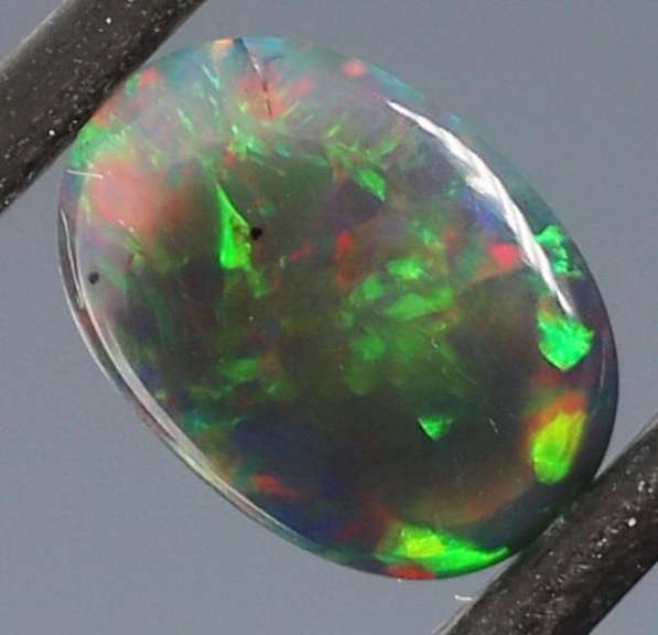 Glistening 1.63ct fiery flashing Welo Black Opal
