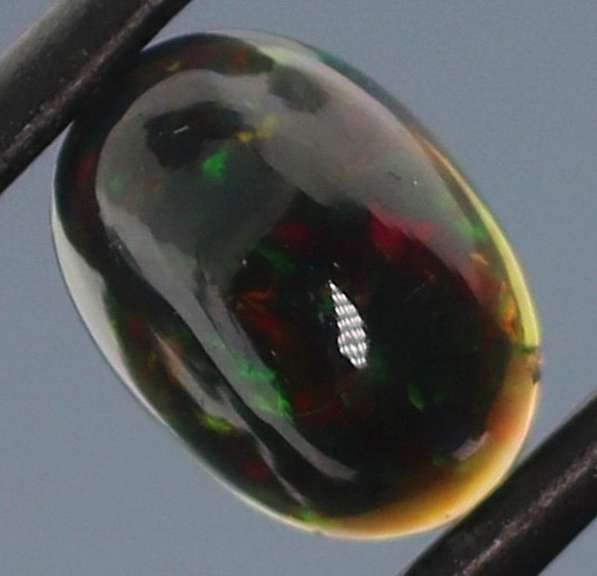 Glistening 1.63ct fiery flashing Welo Black Opal