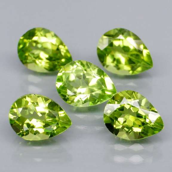 Dazzling 6.18ct untreated apple green Peridot set