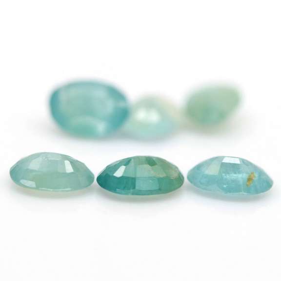 Excellent 8.56ct blue green Grandidierite set