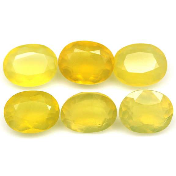 Glistening 19.95ct natural golden Fire Opal set