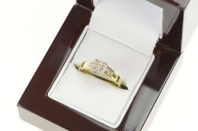 14K Yellow Gold 0.25 Ctw Princess Invisible Set Engagement Ring