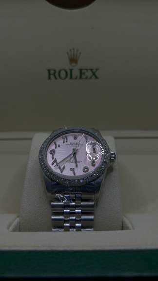 PINK ROLEX OYSTER PERPETUAL DATEJUST WITH AFTERMARKET DIAMOND BEZEL (2.45 CT) IN STAINLESS STEEL