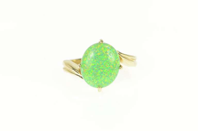 14K Yellow Gold Oval Vibrante Green Syn. Opal Bypass Ring