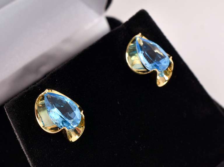 Brilliant Blue Topaz Earrings in 14K Yellow Gold
