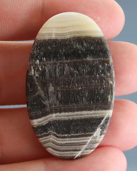 Well defined 54.90ct banded Rhodochrosite Agate