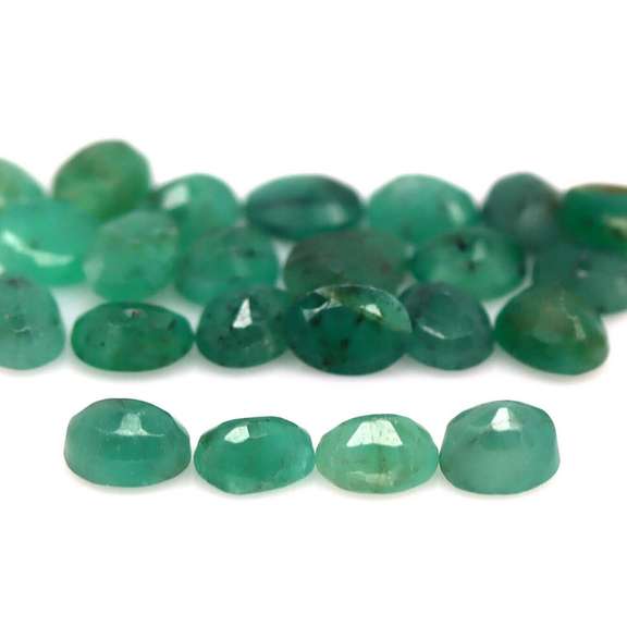 Oval cut 8.56ct Zambian Emerald set