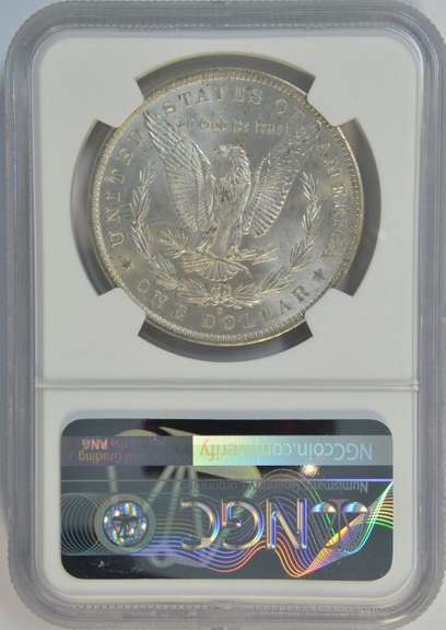 Blazing-white Gem BU 1884-O Morgan Silver Dollar. NGC MS65