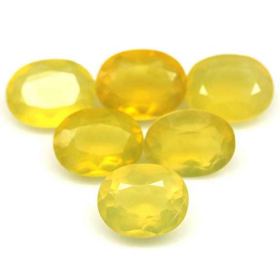 Glistening 19.95ct natural golden Fire Opal set