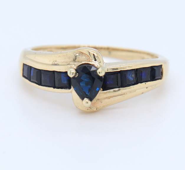 Charming Yellow Gold Pear Shaped and Princess Cut Blue Sapphire Channel Set Ring