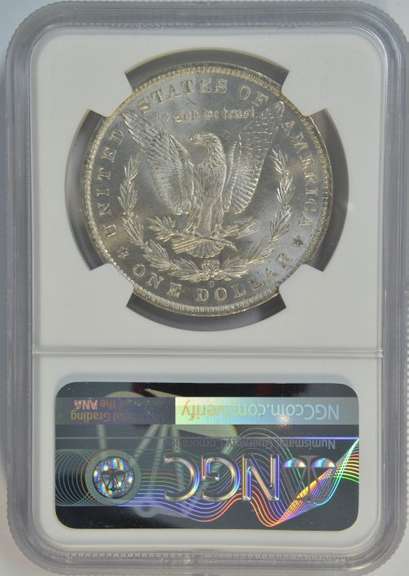 Blazing-white Gem BU 1884-O Morgan Silver Dollar. NGC MS65
