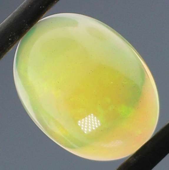 Glowing! 2.50ct full cover floral pattern Jelly Opal