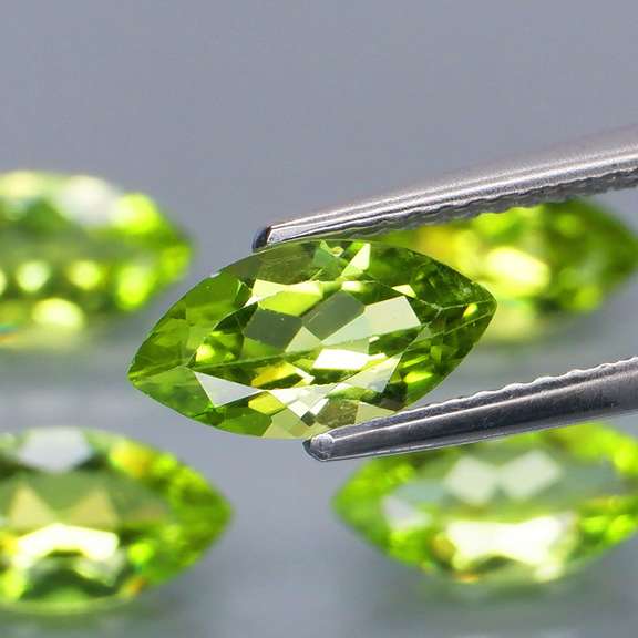 Marquise cut! 4.99ct untreated apple green Peridot set