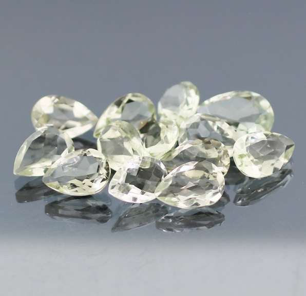 Gem grade 35.28ct pear cut green Quartz set