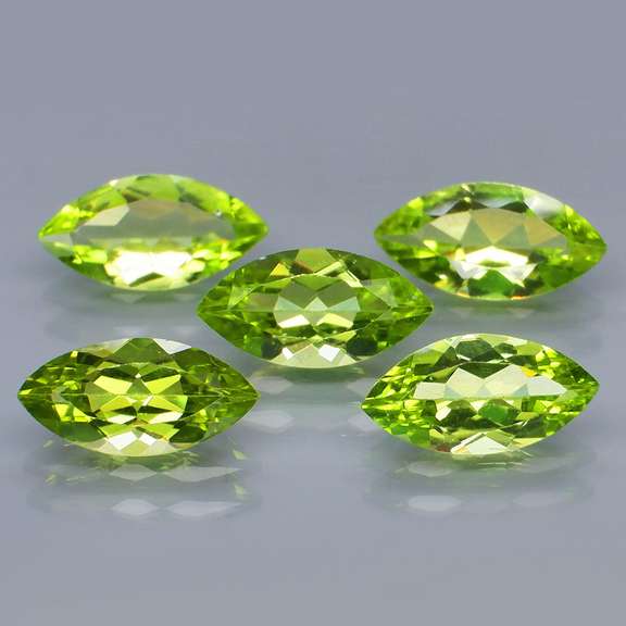Marquise cut! 4.99ct untreated apple green Peridot set