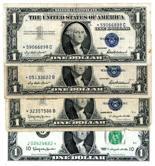 4 $1 US Star Notes. Three 1957 Silver Certificates & 1 1963 Federal Reserve Note