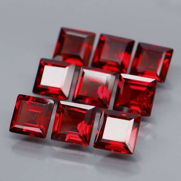 Set of 9 top red VS Garnets weighing 7.99 carats