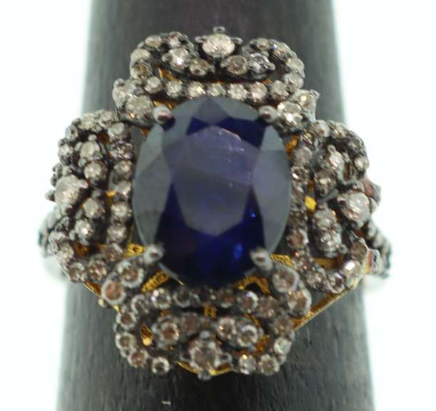 Impeccable Sapphire Ring with Intricate Diamond Studs on top Gold Plated Silver