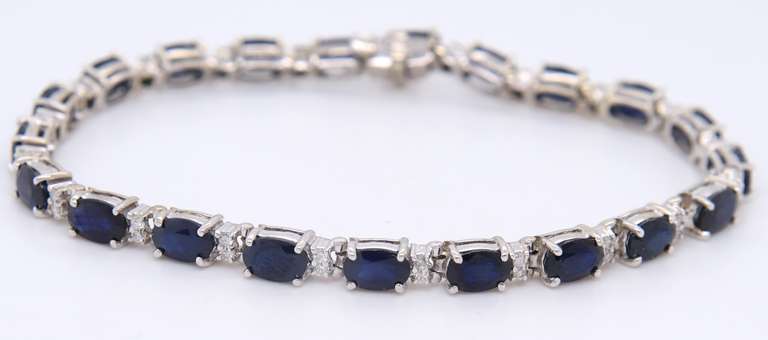 Attractive White Gold oval Blue Sapphire and Diamond Tennis Bracelet