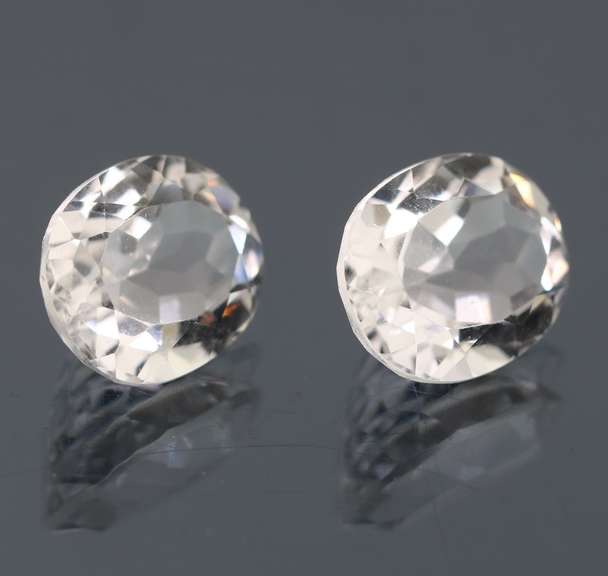 Superb 9.29ct high fire 10x12mm diamond white Topaz