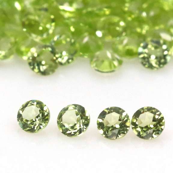 Diamond cut! Unheated! 12.26ct Peridot set