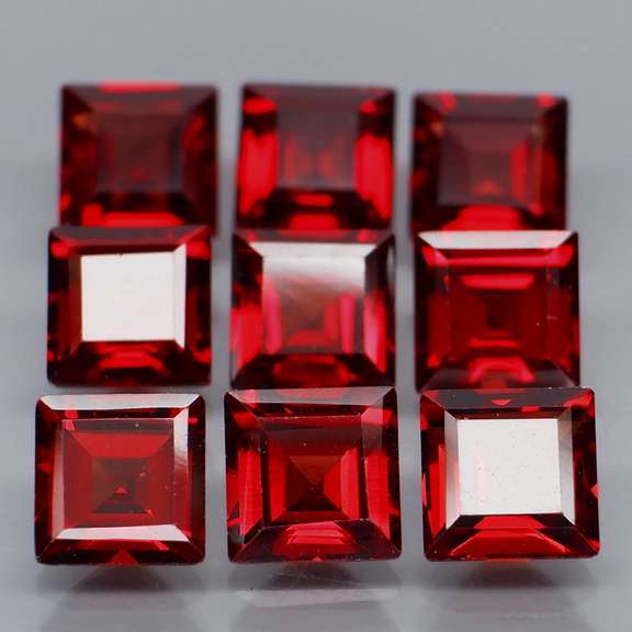 Set of 9 top red VS Garnets weighing 7.99 carats