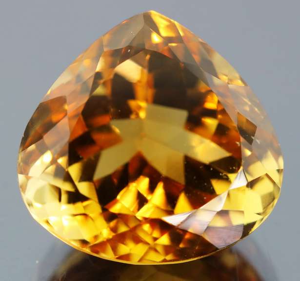 Vibrant 27.77ct golden orange pear cut Citrine
