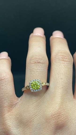 STUNNING FANCY YELLOW DIAMOND ENGAGEMENT RING