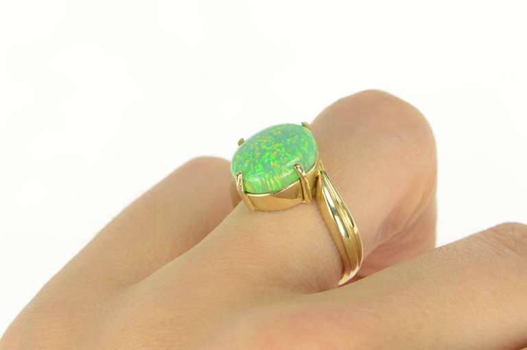 14K Yellow Gold Oval Vibrante Green Syn. Opal Bypass Ring