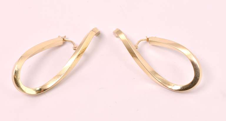 Amazing Twisting Hoop Earrings in 14K Yellow Gold