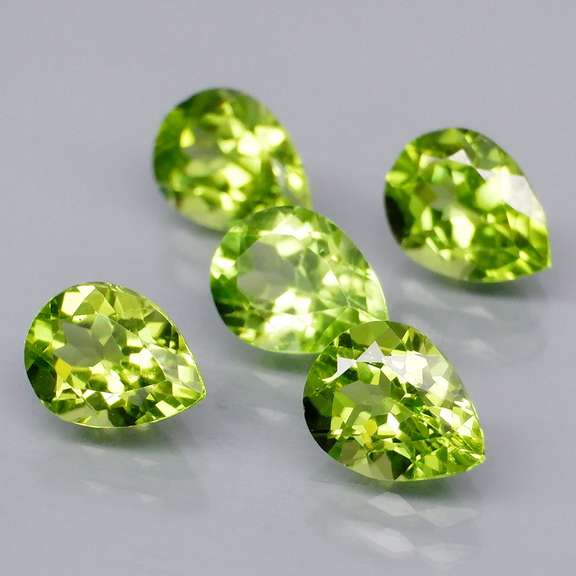 Dazzling 6.18ct untreated apple green Peridot set