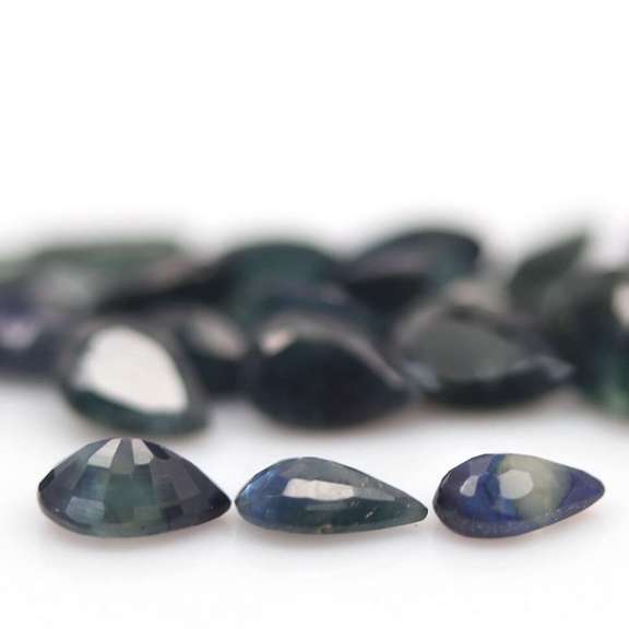 Heated only! 10.83ct blue green Sapphire set