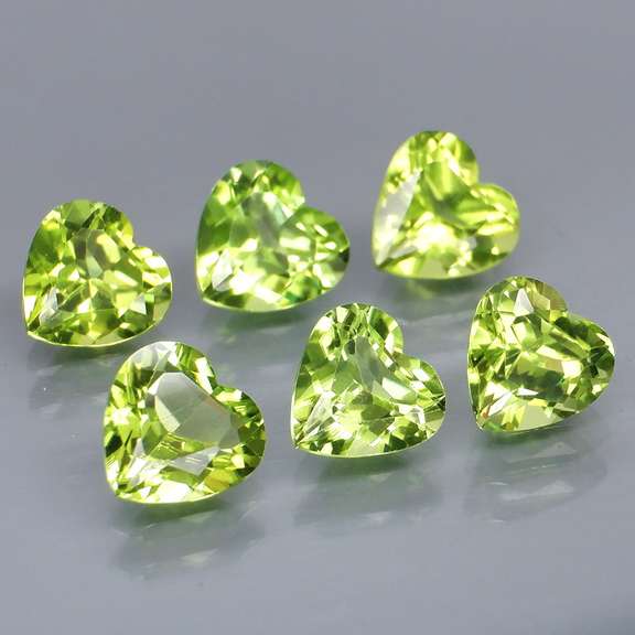 Fantastic 4.76ct 6x6mm heart cut Peridot set