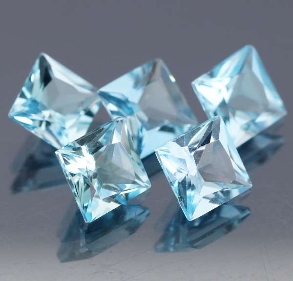 Vivid! 14.05ct princess cut sky blue Topaz set