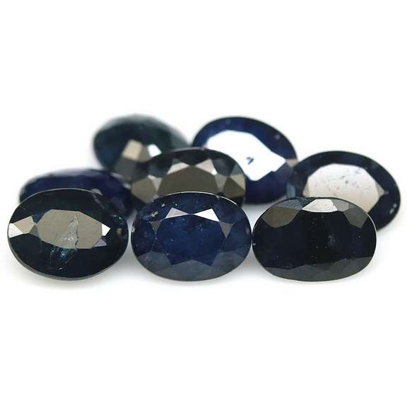 Heated only! 11.90ct Royal blue Sapphire set