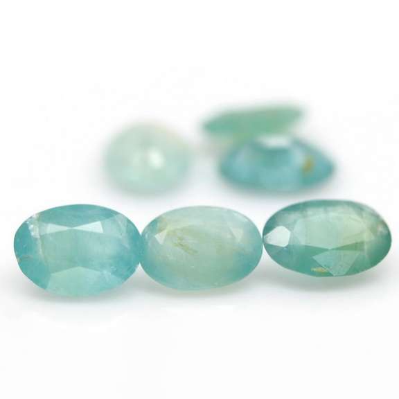 Excellent 8.56ct blue green Grandidierite set