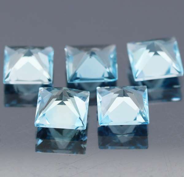 Vivid! 14.05ct princess cut sky blue Topaz set